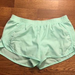 Mint green running shorts size S